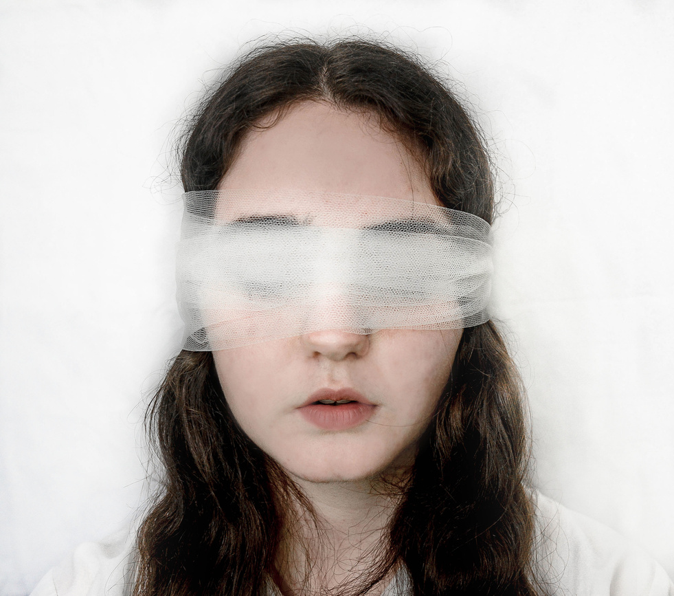 Woman In Blind Fold