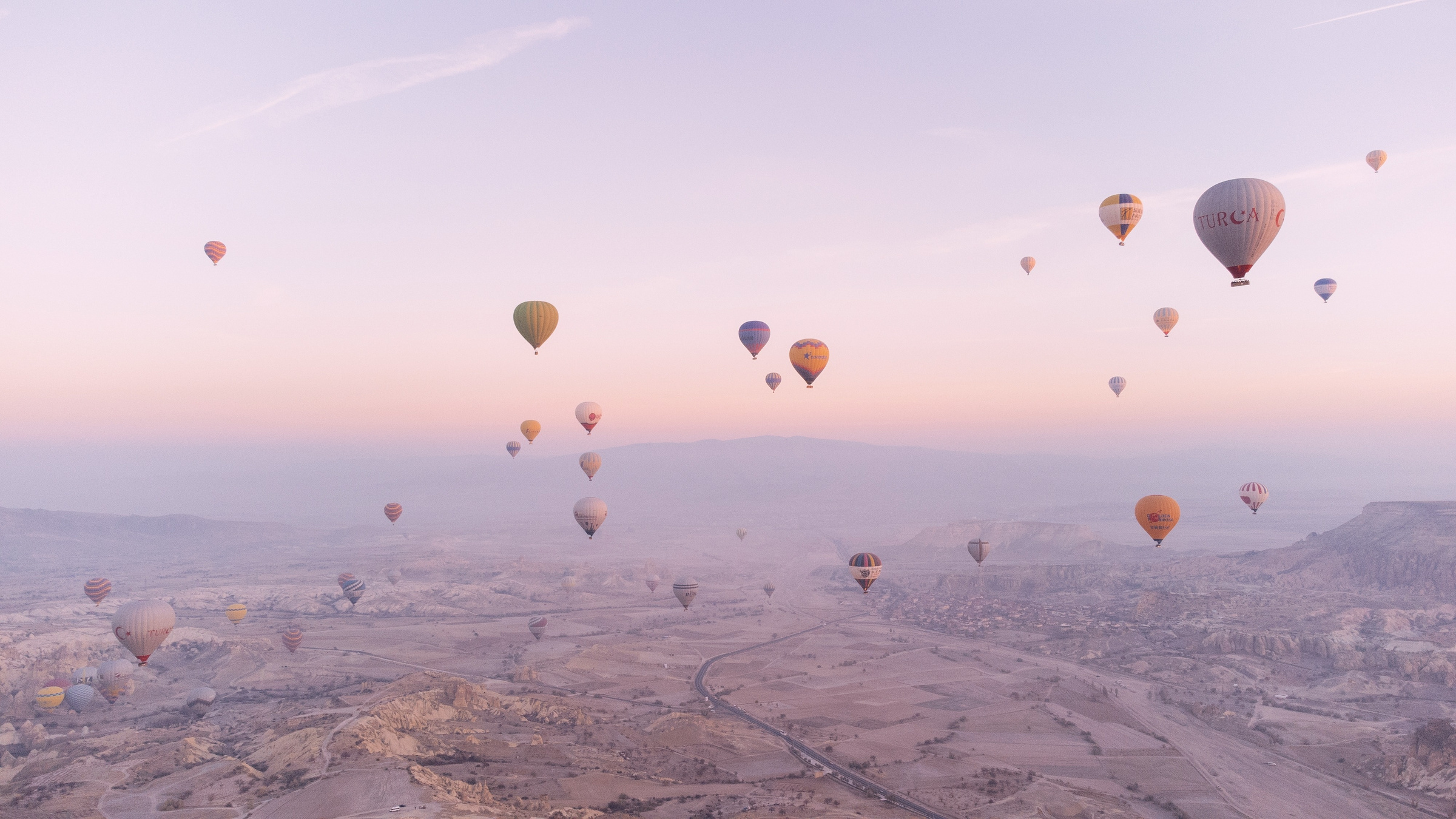 Hot Air Balloons in the Sky at Sunrise