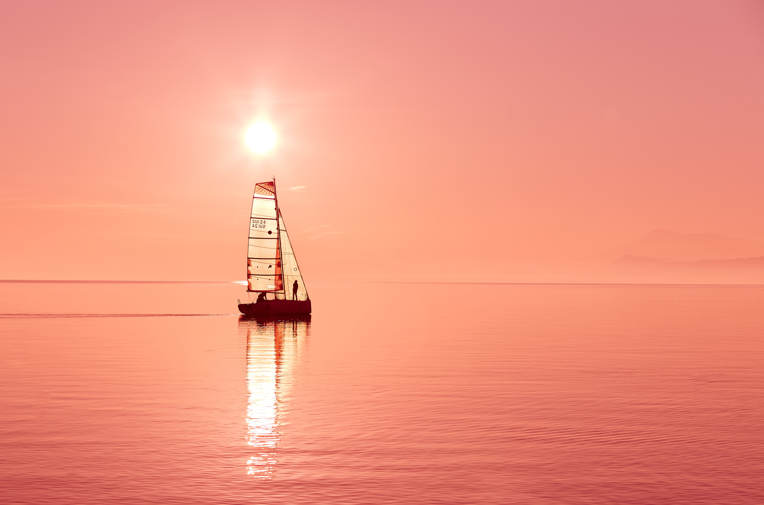 Boat on Body of Water during Sunset